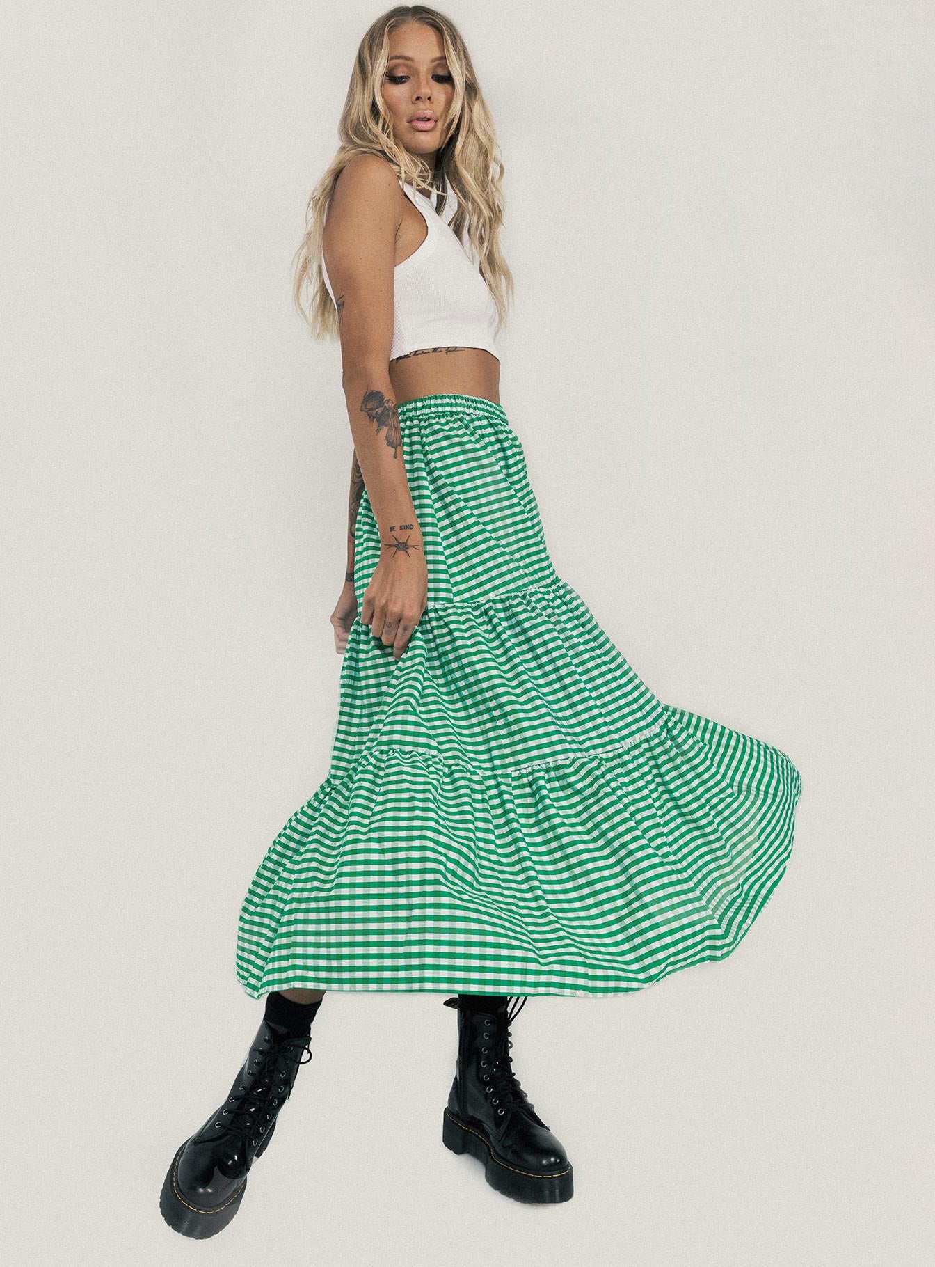   side view of model wearing Princess Polly Hale Midi Skirt Green 