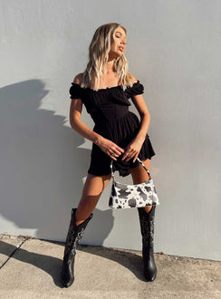 Romper Elasticated shoulders & neckline  Can be worn on or off the shoulder  Gathered bust  Boning through waist  Shirred back panel  Layered bottom 