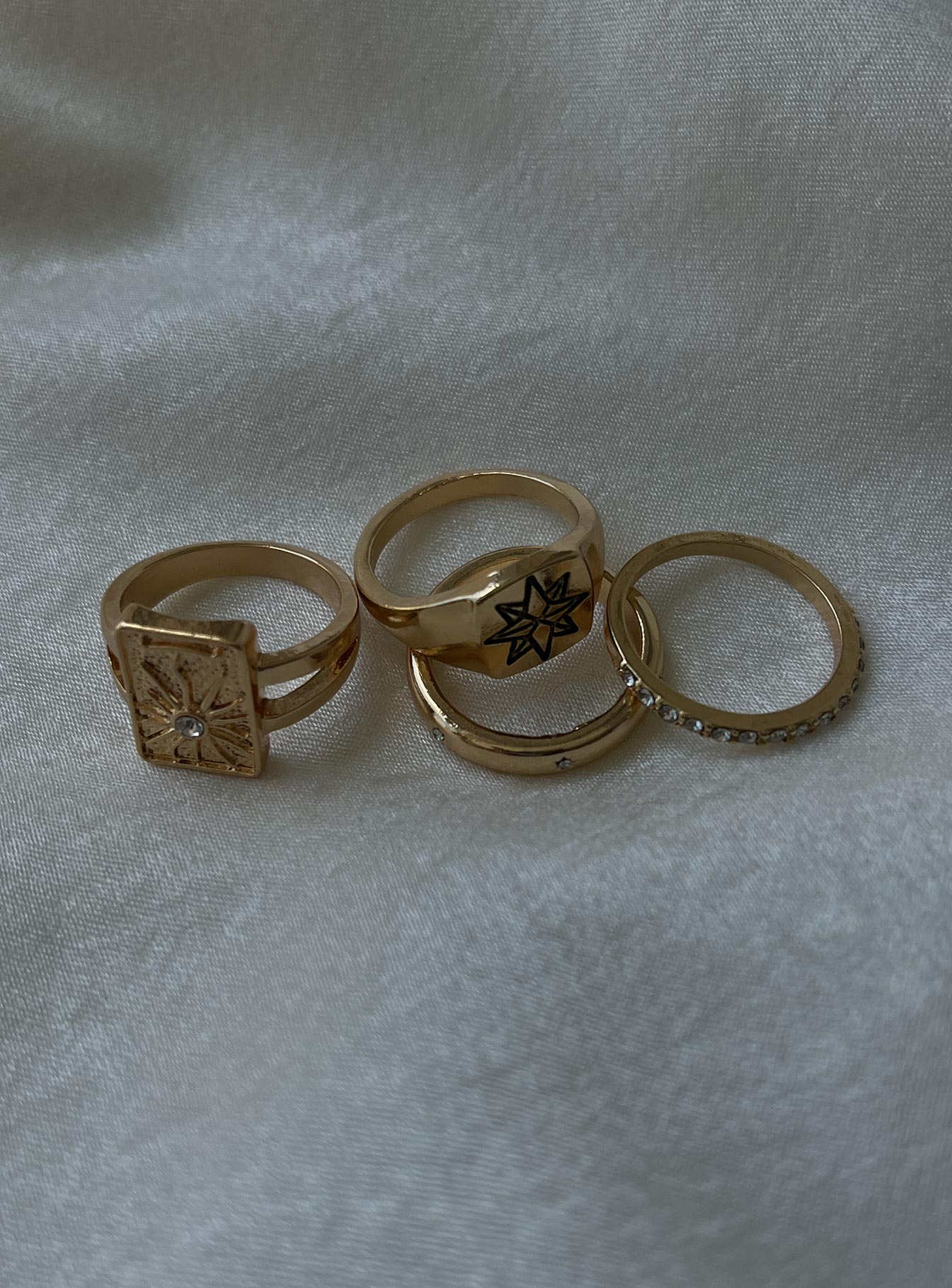 Gold Rings Pack of four  Two signet styles  Two slim bands  Gold-toned 