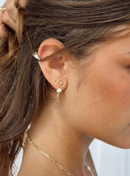 Earrings Gold toned Pearl detail  Stud fastening  Drop chain 