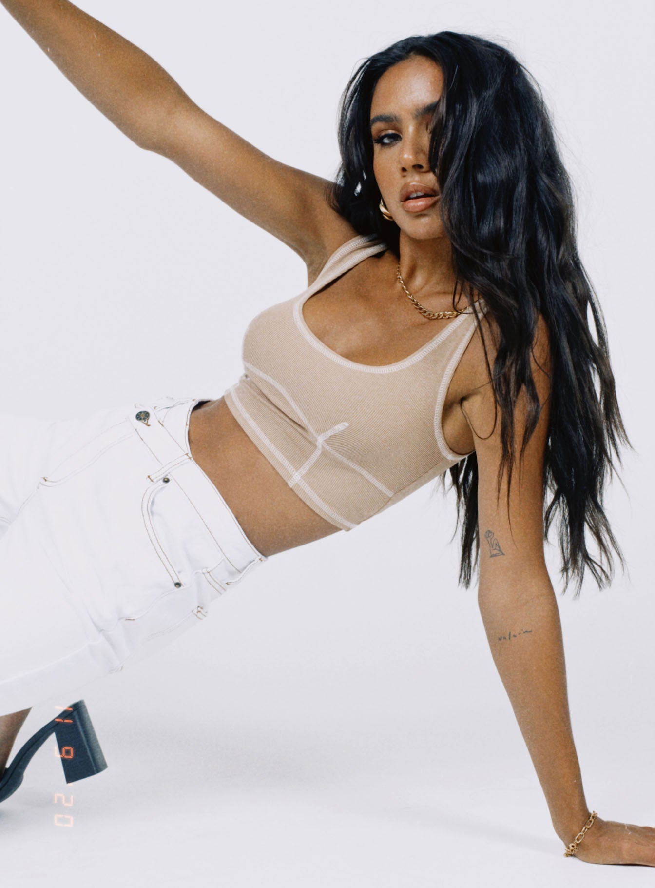 side view of model wearing Princess Polly Carl Top Beige 