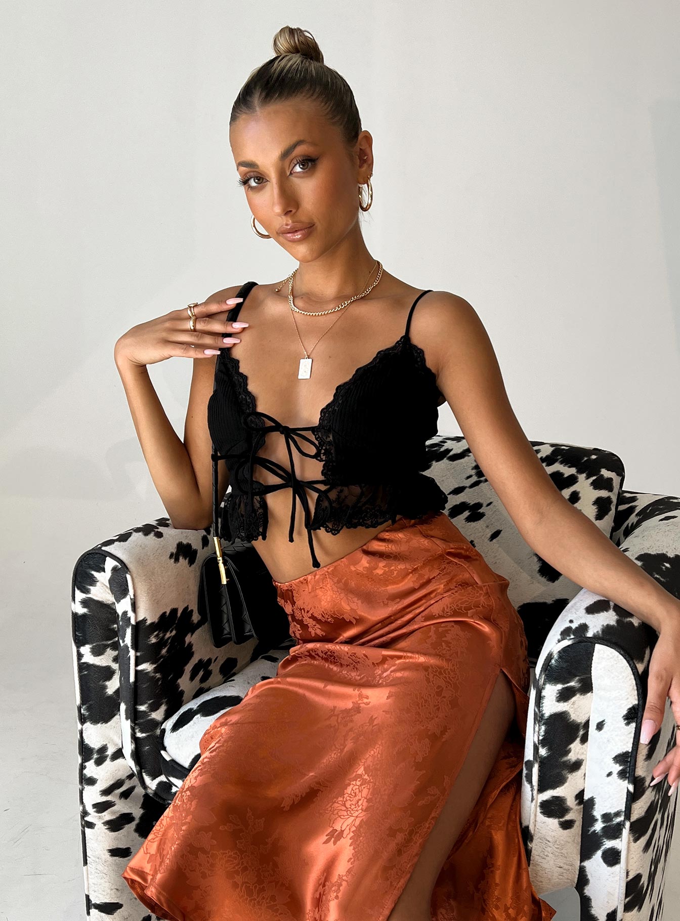 side view of model wearing Princess Polly Arie Top Black 