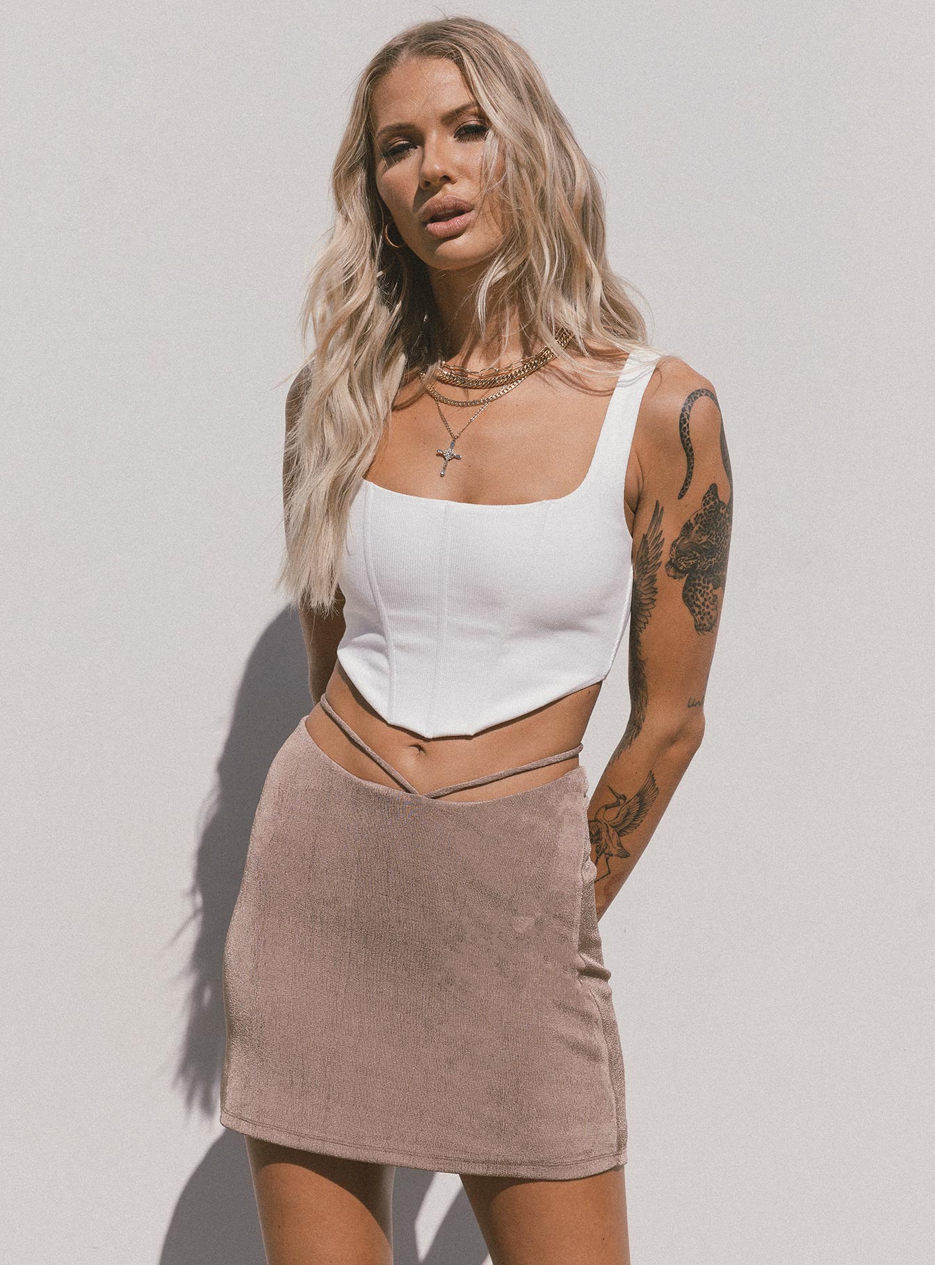 back view of model wearing Princess Polly Maisie Mini Skirt Brown 