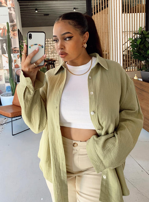 side view of model wearing Princess Polly Mahalia Shirt Green Curve 