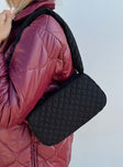 Bag Nylon material Quilted design Fixed strap Zip fastening Internal card slot Flat base