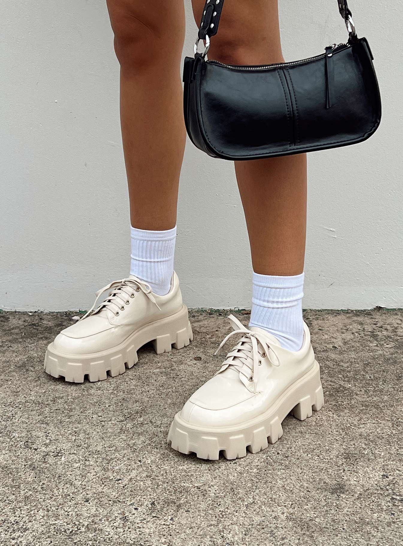 Platform shoes Faux leather Lace up fastening Chunky tread Padded ankle 