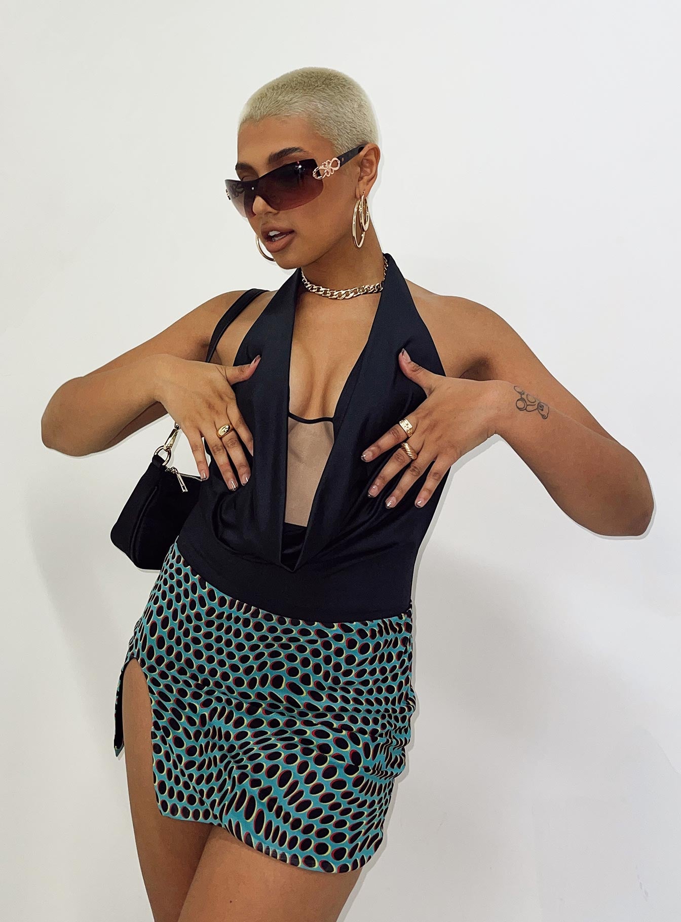 front view of model wearing Princess Polly Kayley Bodysuit Black Sleeveless Cowl 