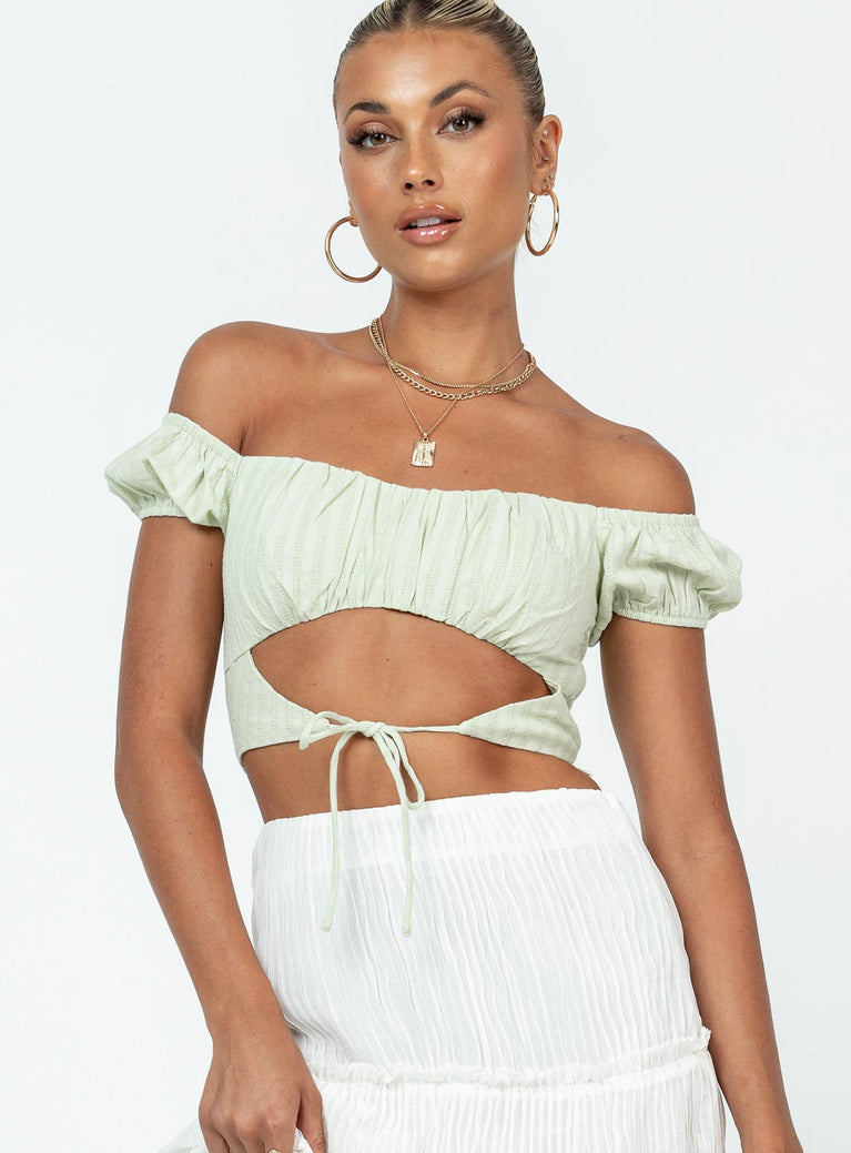 Crop top Princess Polly Exclusive Main: 100% cotton Lining: 100% rayon  Delicate stitching material  Elasticated puff sleeves  Shirred back  Gathered bust  Tie fastening at front 