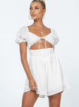 Romper  Princess Polly exclusive Main: 80% polyester 20% cotton Lining: 100% rayon  Soft sheer material  Elastciated shoulders  Puff sleeves  Tie fastening at bust  Cut out midriff  Shirred back  Invisible zip fastening at back 