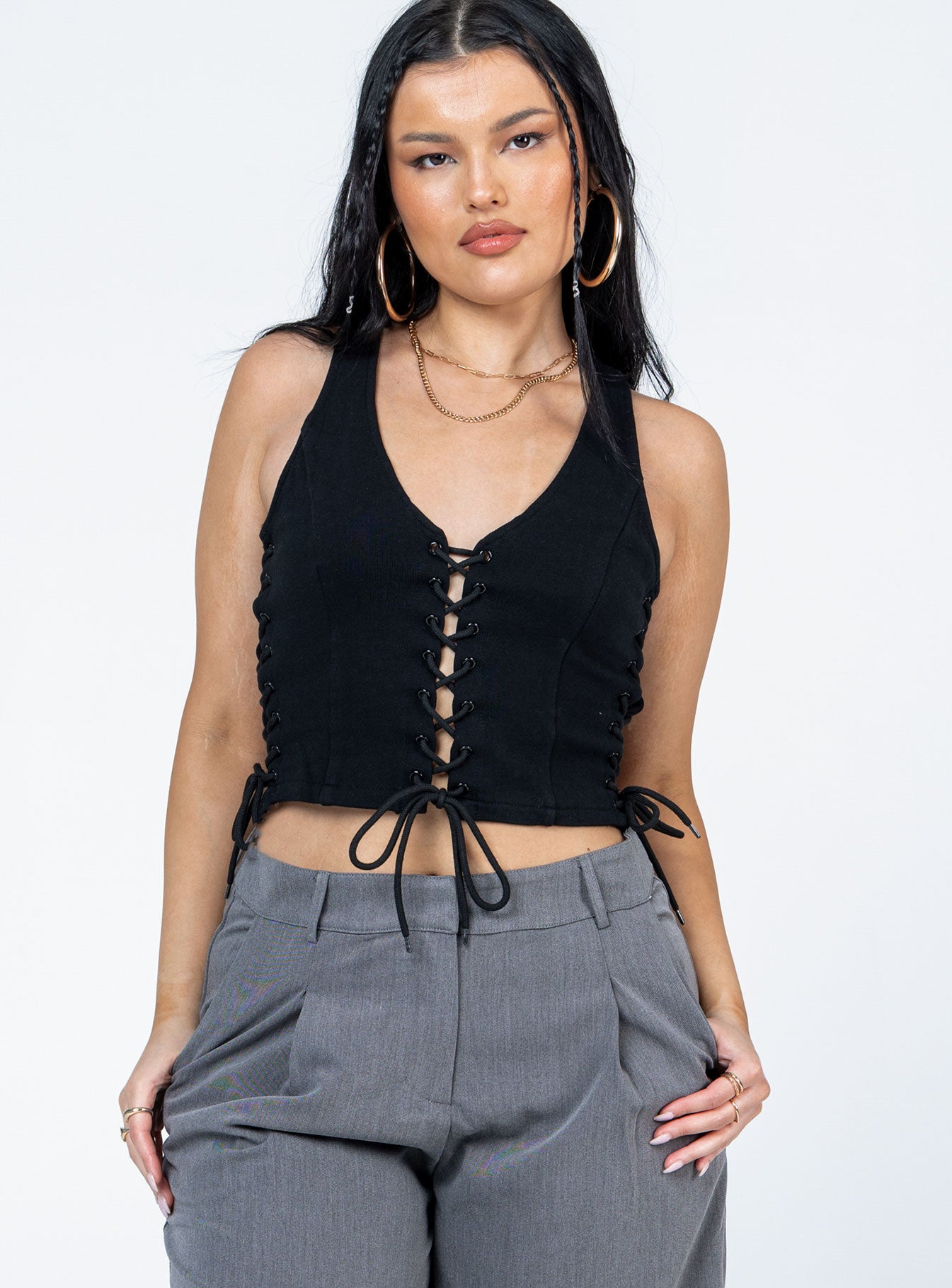 front view of model wearing Princess Polly Walker Top Black Sleeveless Scoop Neck 