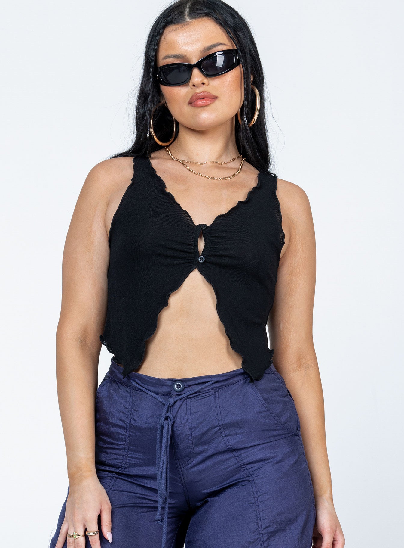 front view of model wearing Princess Polly Amyra Top Black Sleeveless V-Neck 