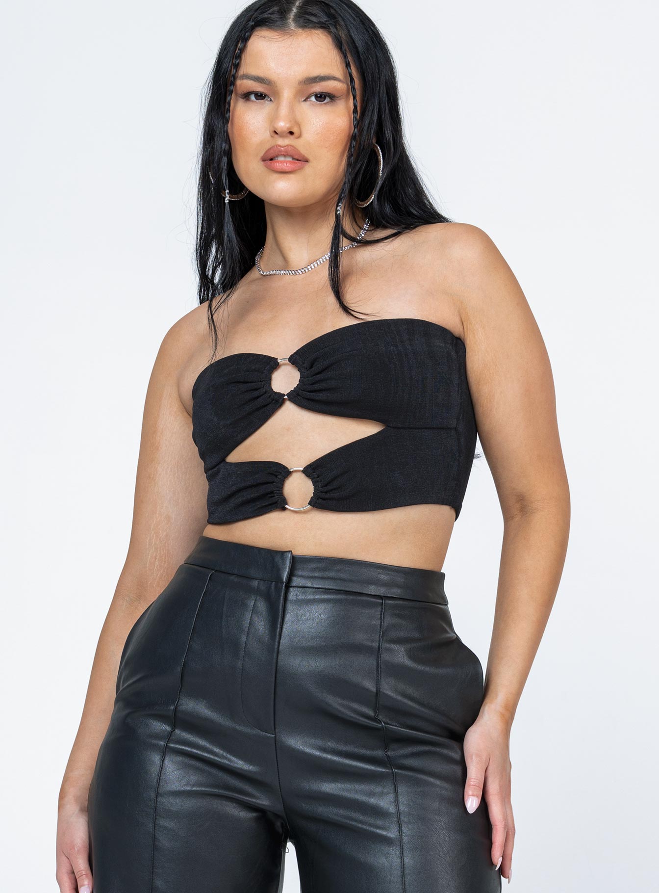 Front view of model wearing  front Princess Polly Sleeveless Asymmetric Neckline  Takeover Top Black