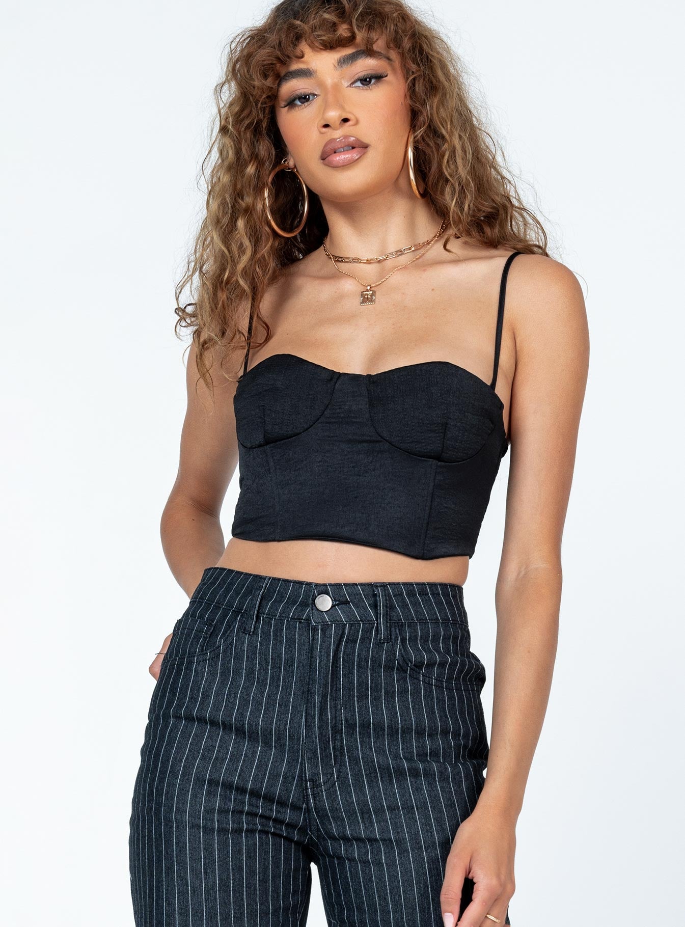 front view of model wearing Princess Polly Doreen Top Black Sleeveless Sweetheart 