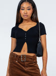 Crop top slim fitting wide neck button up capped sleeves