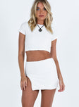 Matching set Textured material Cropped tee Low rise mini skirt  Elasticated waistband  Side slit  Good stretch  Fully lined 