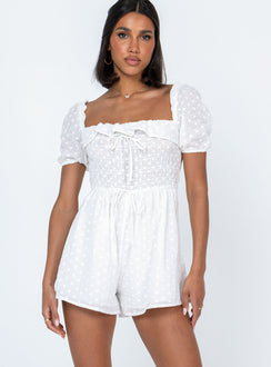 White romper Sheer design  Floral stitched material  Elasticated shoulders Puff sleeves Frill neckline  Shirred bust Fixed tie at waist 