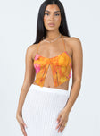 Front view of model wearing  front Princess Polly Sleeveless Square Neck  Motel Shaman Top Orange