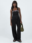 Overalls Contrast stitching Adjustable shoulder straps  Large chest pocket  Button fastening at hips  Four classic pockets  Wide leg 