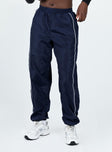 Front view of model wearing  front Princess Polly  Genelin Pants Navy