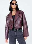 Oversized jacket Faux leather material  Lapel collar  Zip front fastening Twin hip pockets Removable buckle belt Zip at cuffs 