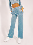 Front view of model wearing  front Princess Polly  Velour Track Pant Blue