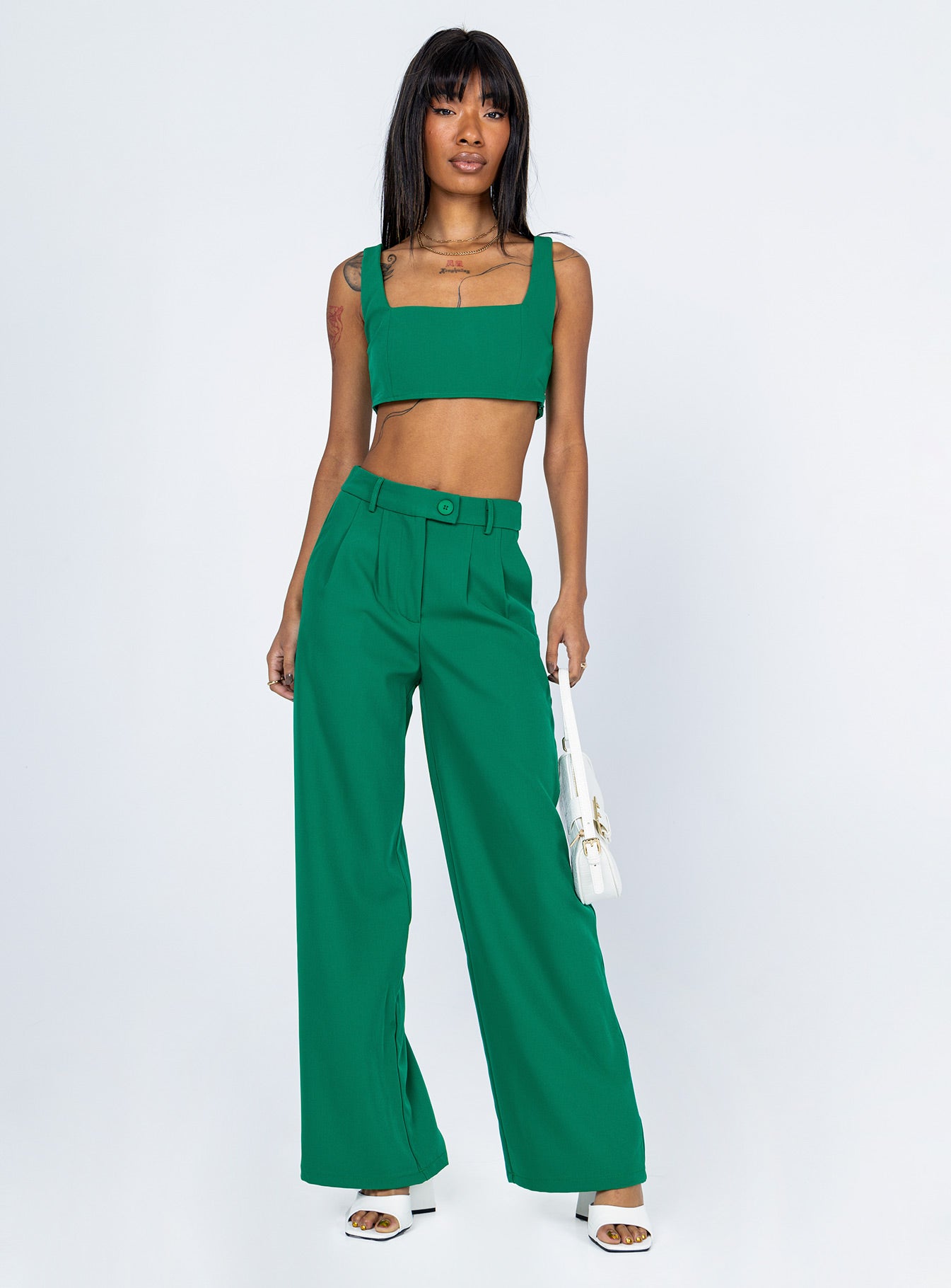 Matching set Crop top Fixed straps Invisible zip fasting at side High waisted pants Wide relaxed leg Belt loops at waist Zip & button fastening Lined top