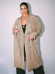 Trench coat Wide lapel collar  Double-breasted front Tie fastening at cuffs  Belt loops with detachable belt Twin hip pockets