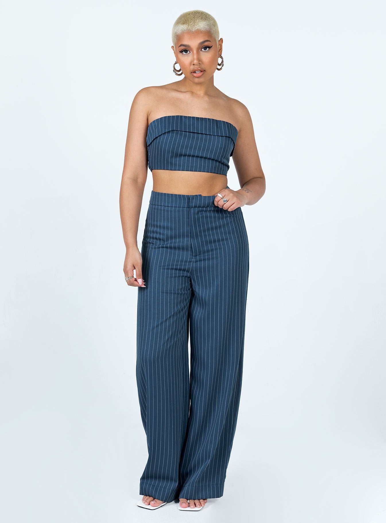 Matching set Pinstripe print Crop top Folded neckline Inner silicone strip at bust Invisible zip fastening at side Shirred back panel Tailored pants Hook & zip fastening Wide leg