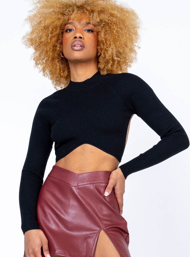 Long sleeve crop top  Slim fitting  50% viscose 28% polyester 22% nylon  Knit material  Mock neck  Shaped underbust  Back tie fastening  Backless design