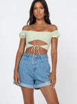 Denim shorts Zip & button fastening  Belt looped waist  Pleated waist  Twin hip pockets  Fixed rolled hem  Branded patch on back 