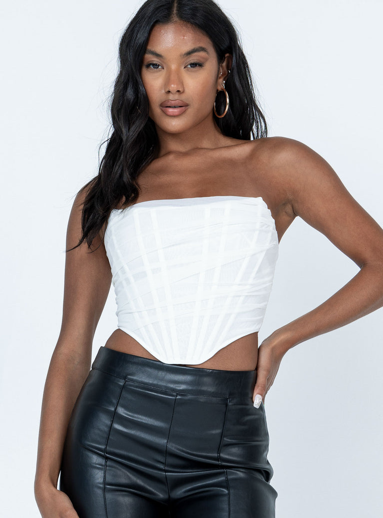 Crop top  Slim fitting  Shell: 85% polyester 15% elastane  Lining: 95% polyester 5% elastane  Mesh material Boning throughout  Pointed neckline  Inner silicone strip at bust  Zip fastening at back  Slight stretch  Fully lined 
