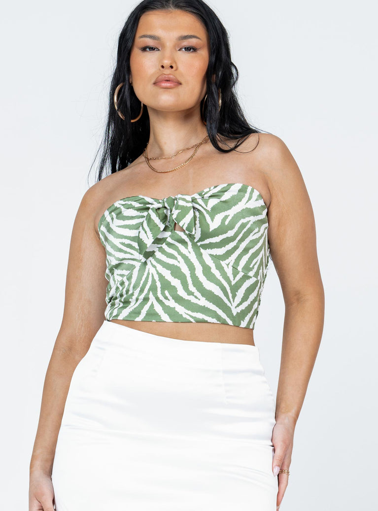Strapless top  Silky material  Zebra print  Tie fastening at bust Shirred back panel  Lined bust