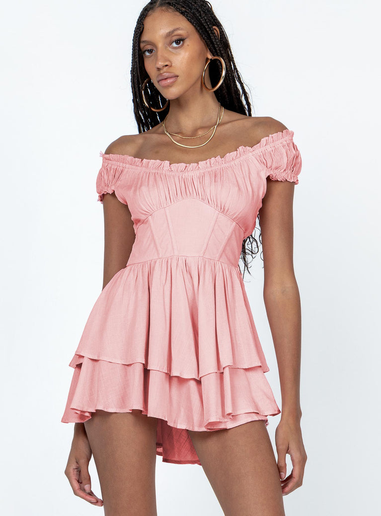 Romper Elasticated shoulders & neckline  Can be worn on or off the shoulder  Gathered bust  Boning through waist  Shirred back panel  Layered bottom 