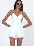 Romper Silky material  Lace trimming  Elasticated shoulders Tie at bust  Shirred back  Invisible zip fastening at back 