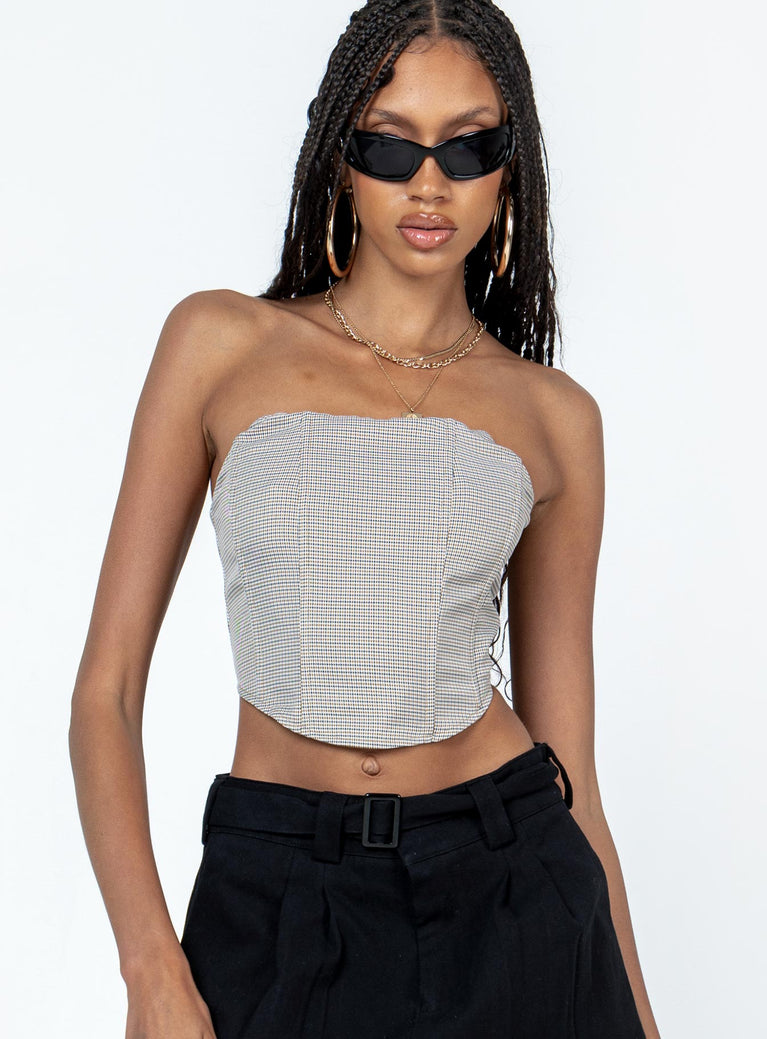 Bustier top Slim fitting Princess Polly Exclusive  Main: 96% polyester 4% elastane Lining: 95% polyester 5% elastane Houndstooth print Inner silicone strip Strapless design Boning throughout Zip fastening at back