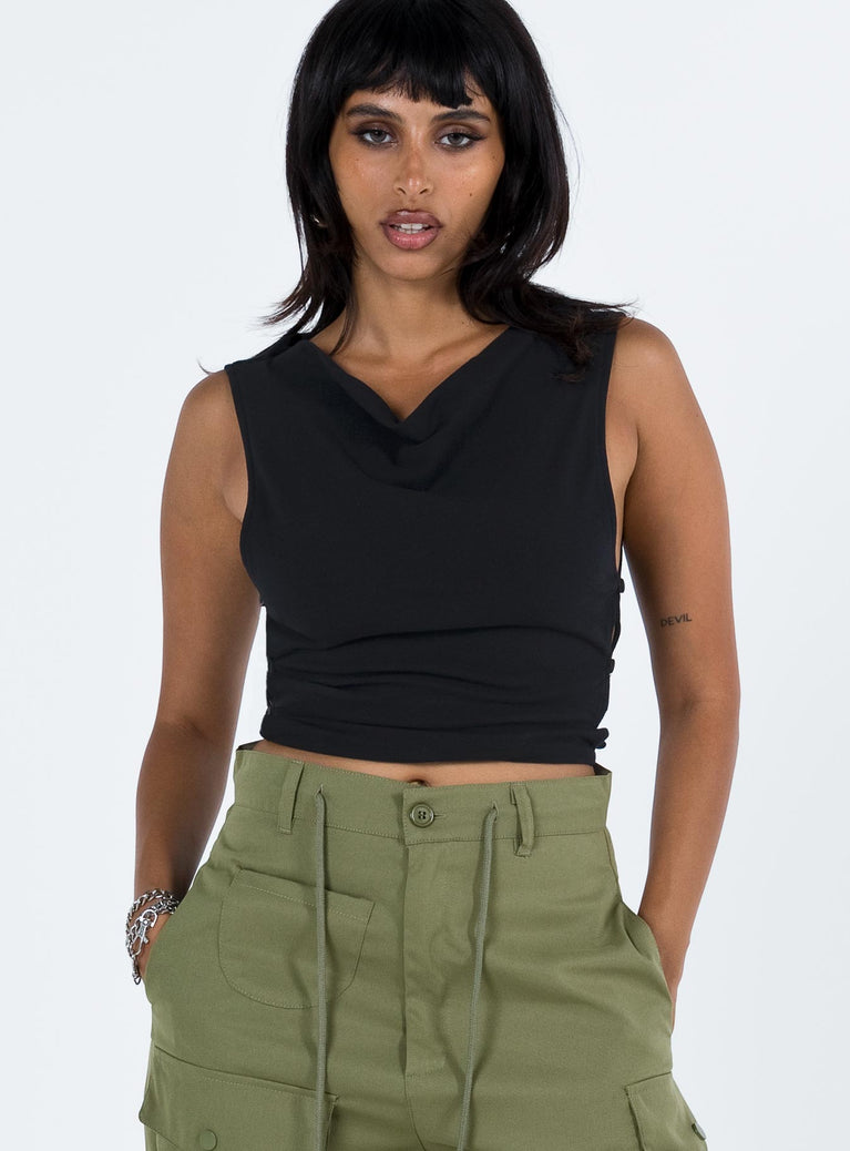 Black crop top Cowl neckline Cut out at side Button fastening at side Good stretch Fully lined 