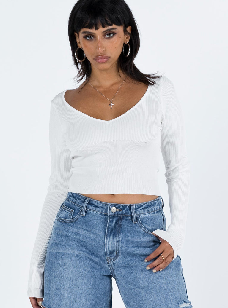 White long sleeve top Ribbed material V neckline Good stretch Unlined 