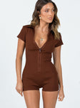 Playsuit Ribbed material  Classic collar  Cap sleeves  Zip front fastening  Short leg