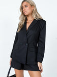 Black blazer Lapel collar  Padded shoulders  Button front fastening  Twin hip pockets 