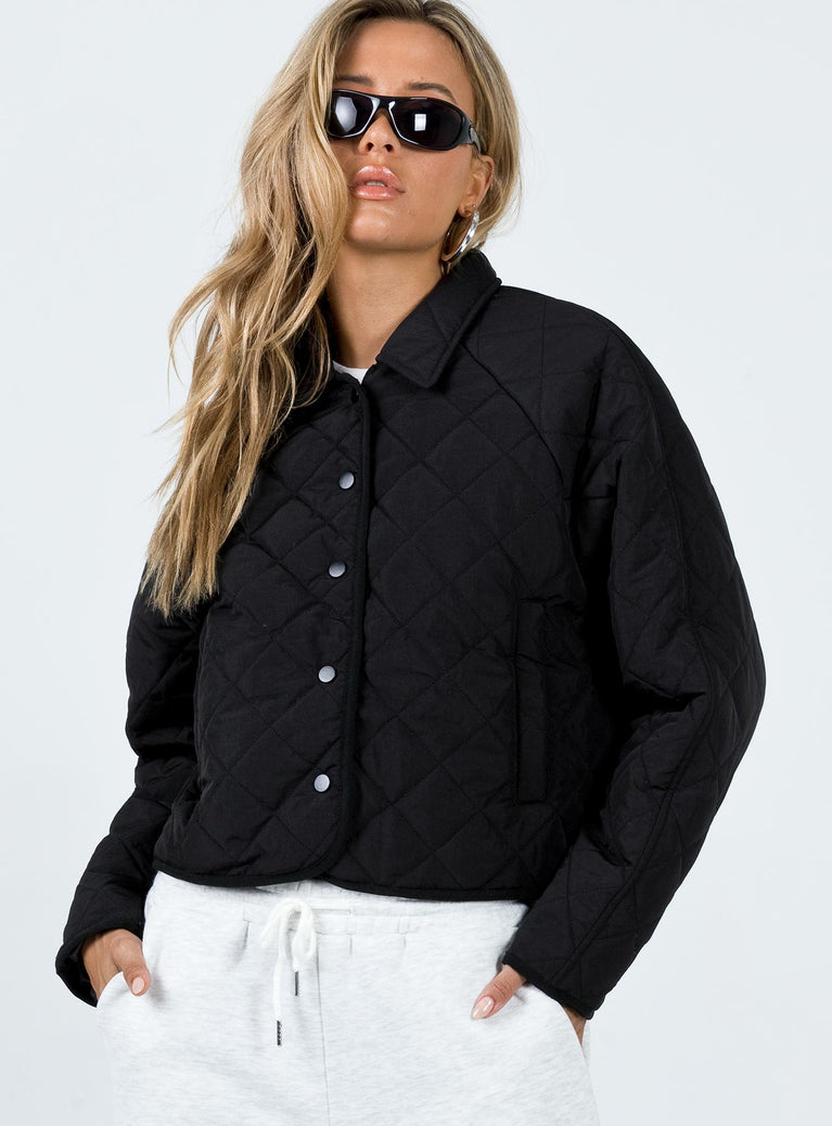 Cropped jacket Quilted material Pointed collar Press button fastening Twin hip pockets Non-stretch