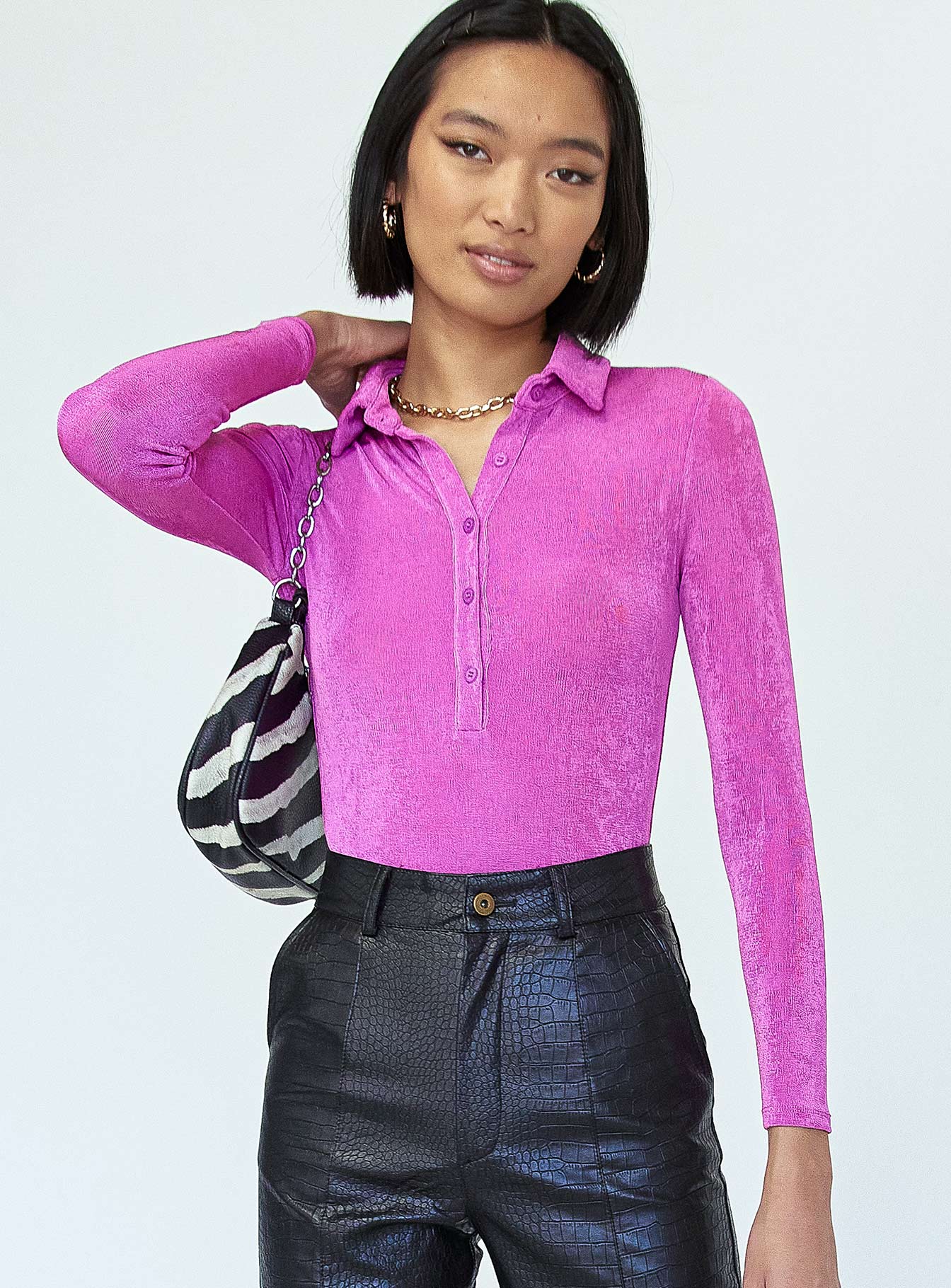 front view of model wearing Princess Polly Elody Long Sleeve Bodysuit Purple Full Sleeves V-Neck 