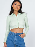 front view of model wearing Princess Polly Anson Long Sleeve Top Green 