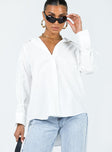 Front view of model wearing  front Princess Polly Full Sleeves V-Neck  Fitzroy Shirt White