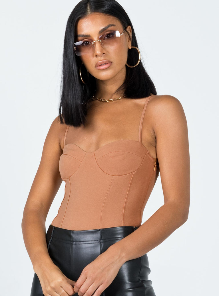 Bodysuit  Slim fitting  Princess Polly Exclusive 90% polyester 10% elastane  Adjustable shoulder straps  Sweetheart neckline  Stitched cups  Invisible zip fastening at side  High cut leg  Cheeky cut bottom  Press clip fastening at base 