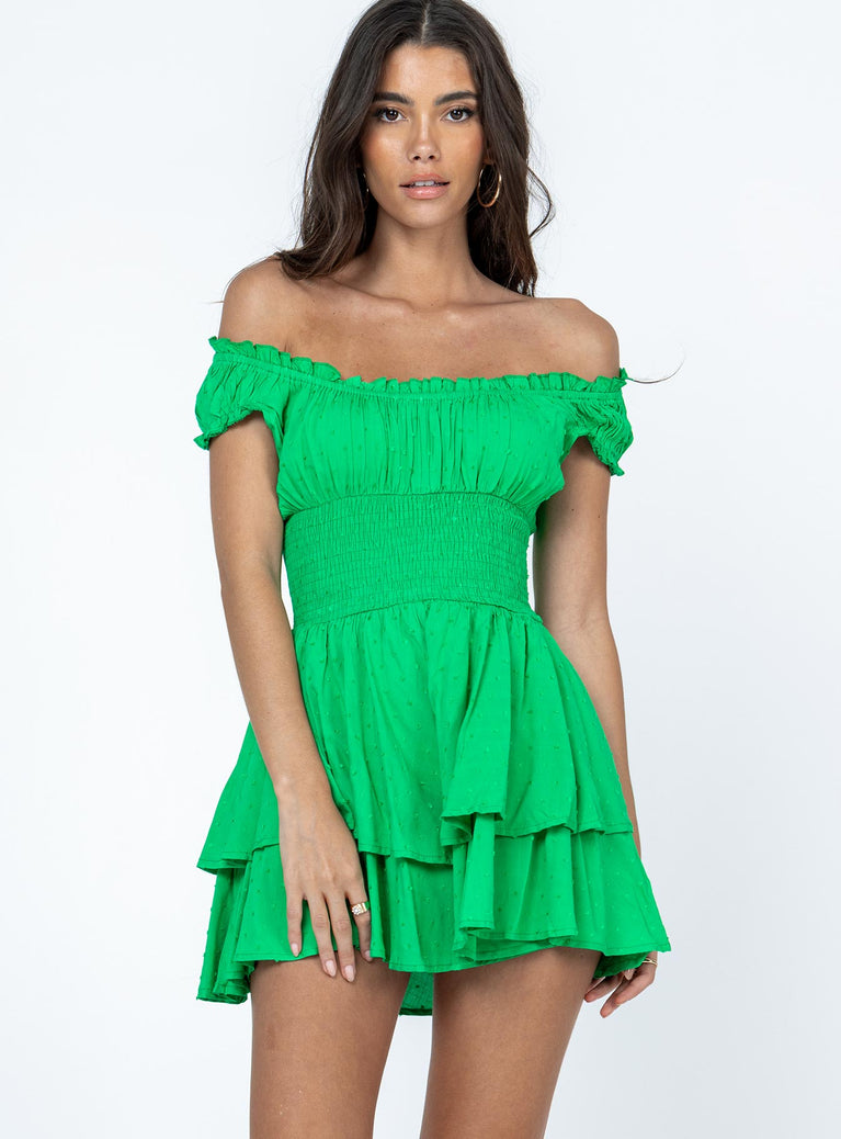 Romper Soft textured material Shirred waistband Ruffle detailing Elasticated neck & sleeves Can be worn on or off-shoulder Layered ruffle hem