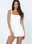 Romper Tie shoulder straps  Tie at bust  Fitted waist  Invisible zip fastening at back  Non-stretch