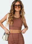 Front view of model wearing  front Princess Polly Sleeveless Square Neck  Kesor Top Brown