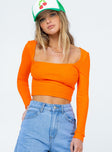 front view of model wearing Princess Polly Kinsey Long Sleeve Top Orange 