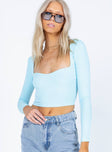 front view of model wearing Princess Polly Matias Long Sleeve Top Blue 