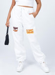 front view of model wearing Princess Polly Jasmine Graphic Track Pants White 